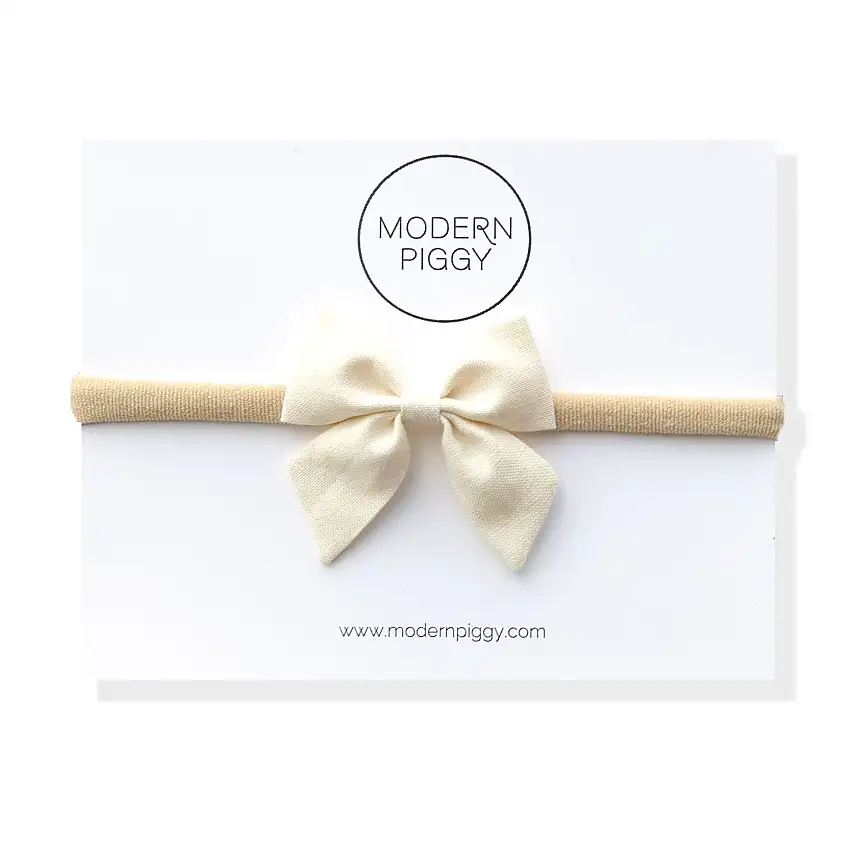 Whisper | Mini Piggy Bow